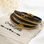 Pulseira de couro com o símbolo do infinito e cabochão da árvore da vida em ouro para personalizar  