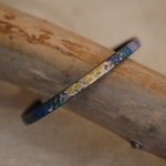 Pulseira de mulher em pele fina com impressão impressionista