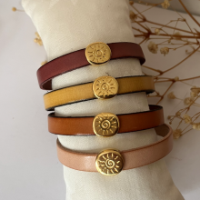 Bracelet cuir au cabochon soleil doré pour femme 