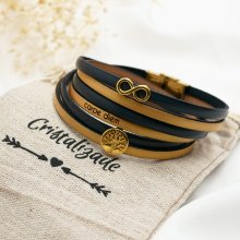 Pulseira de couro com o símbolo do infinito e cabochão da árvore da vida em ouro para personalizar  